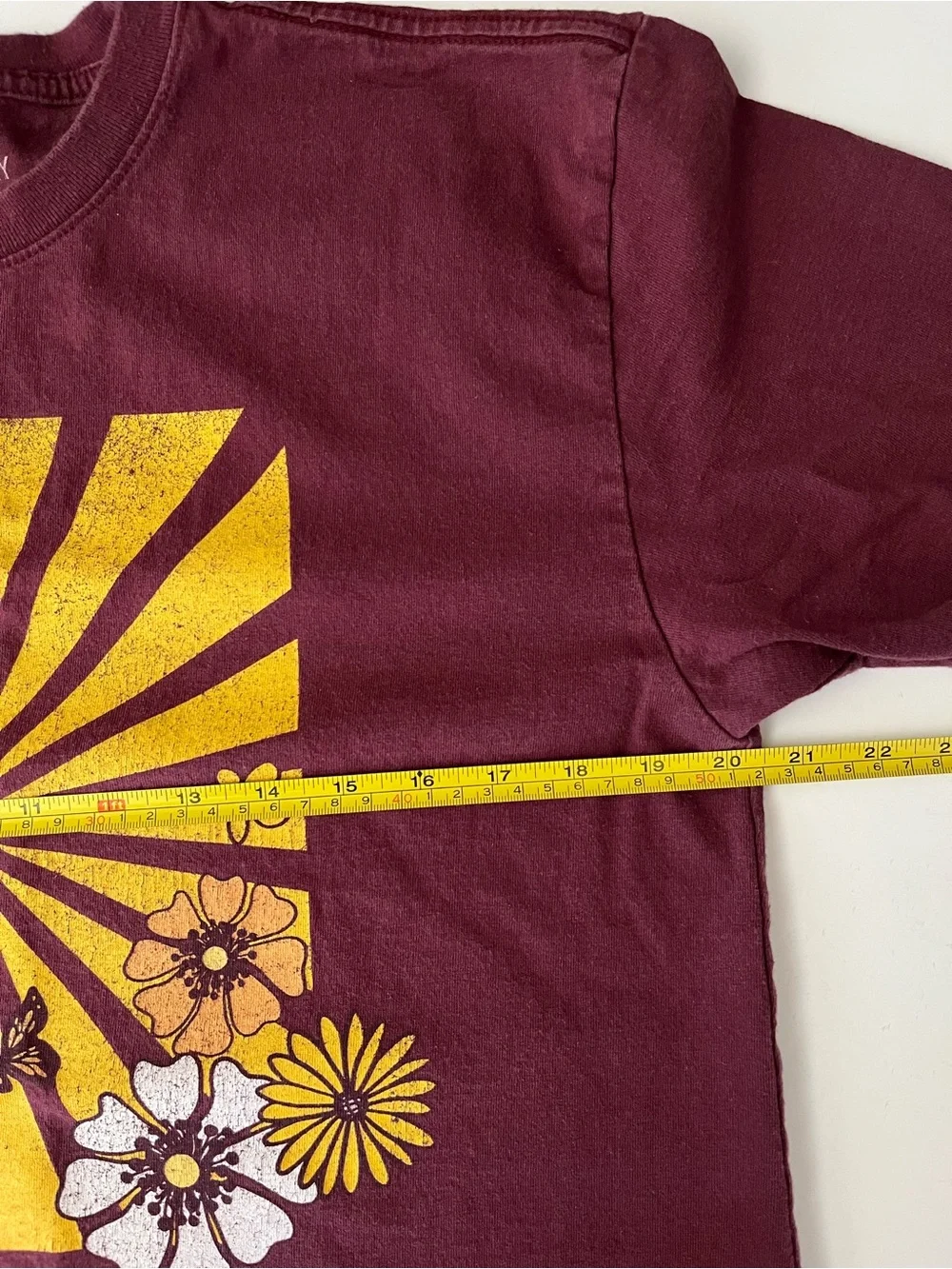 Roxy | Maroon Short-Sleeve Tee with Yellow Floral Sunburst Graphic